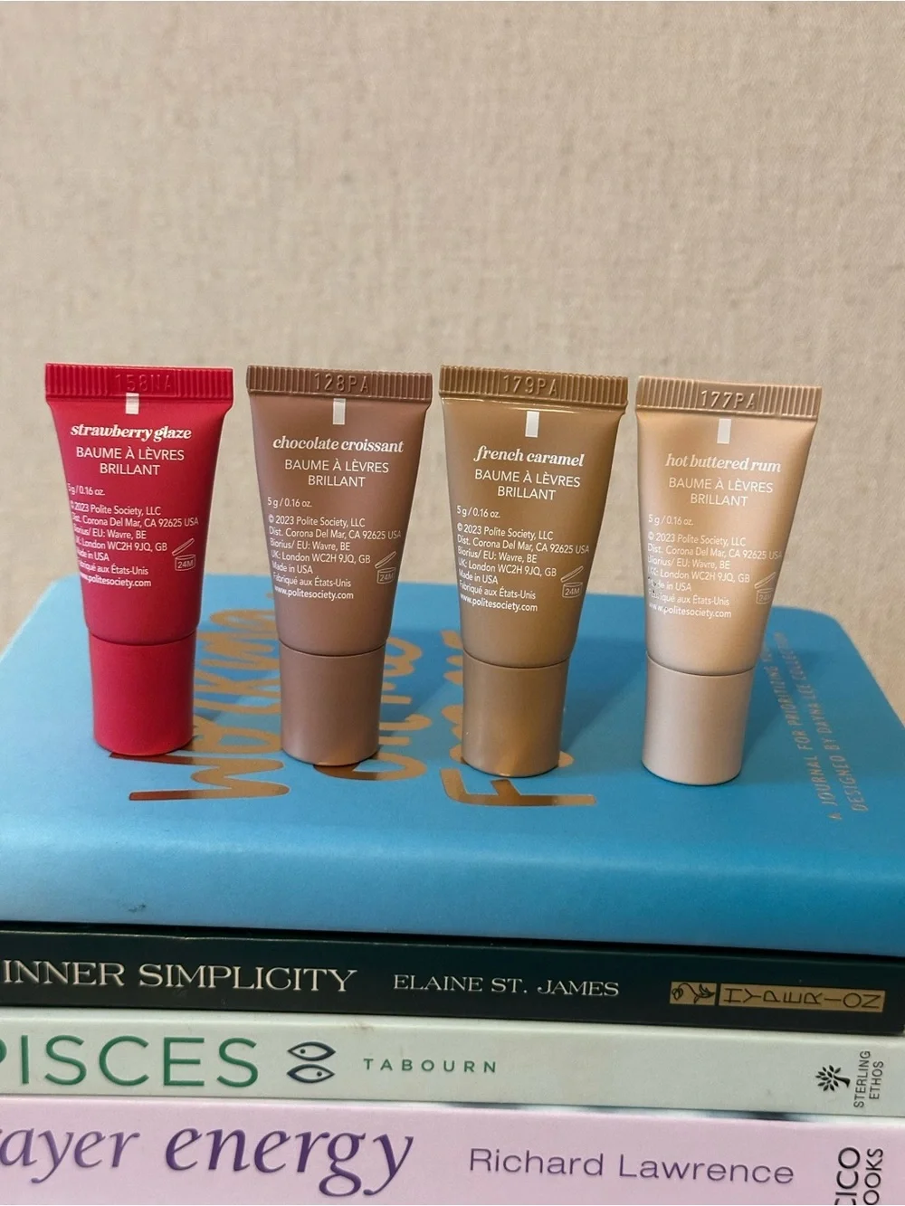 Polite Society Glossy Mini Lip Balm Set — Red, Brown, Tan, Cream